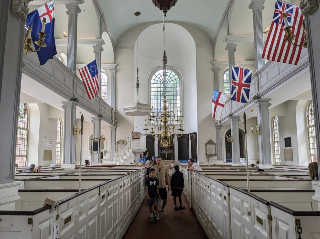 Visitors exploring Old North Church during the historic site’s 2023 Independence Day celebration. Photo credit: Old North Illuminated. 